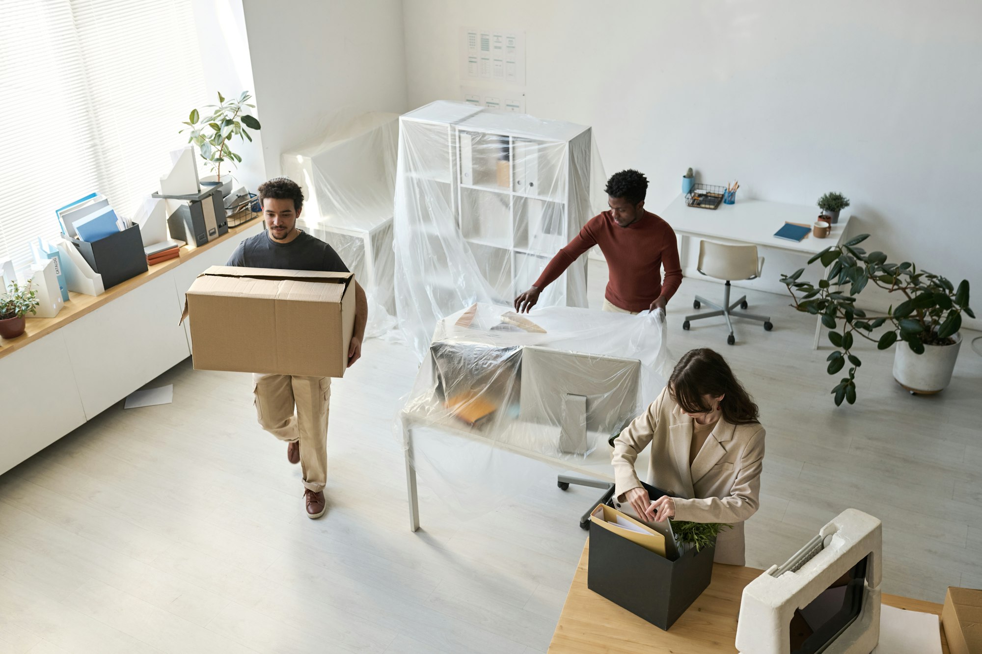 Business people moving in new office