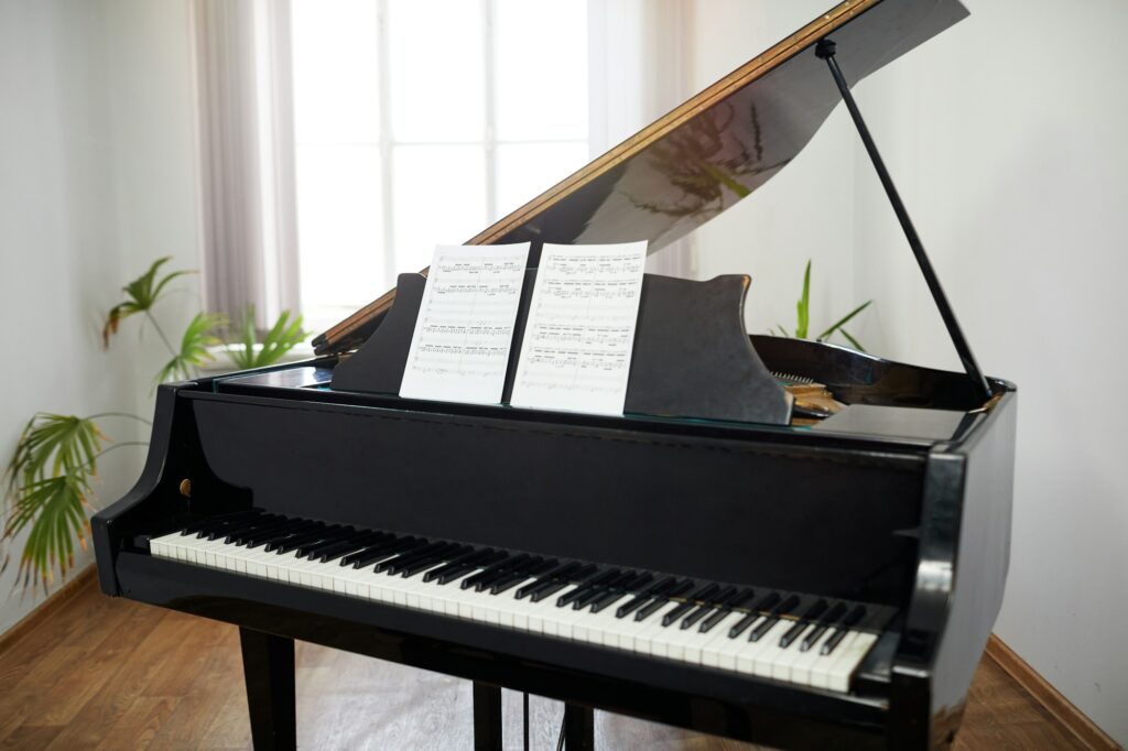 Grand piano with sheet music in the classroom